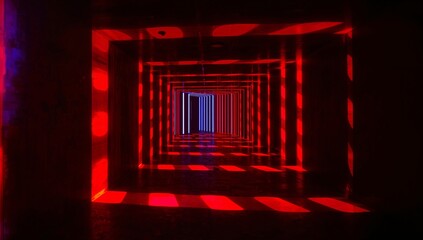 Fototapeta premium Light Patterns Create a Colorful Tunnel Effect in an Indoor Space at Night