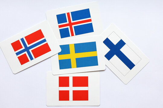 Flags of the five nordic countries. Iceland, Norway, Sweden, Finland and Denmark.