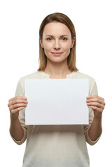 Fototapeta premium Young Woman Holding Blank White Sign for Advertising Mockup or Marketing Template Isolated on White or Transparent Background PNG