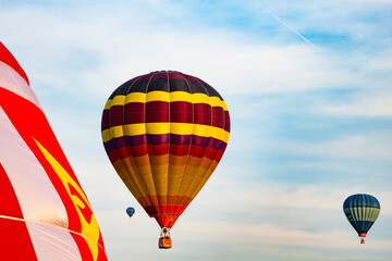 Fototapeta premium Colorful hot air balloons flying in blue sky