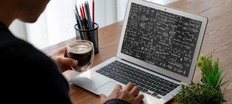 Mathematic equations and modish formula on computer screen showing concept of science and education