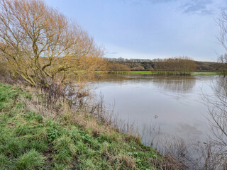 A beautiful sunset over the waterlands at the Attenborough Nature Reserve in Nottingham, UK.