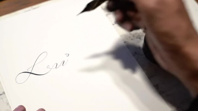 Calligrapher Writing with Fountain Pen on Paper.