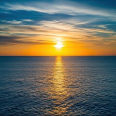 Obraz premium Golden Sunset Over the Ocean - A Serene and Tranquil Scene.