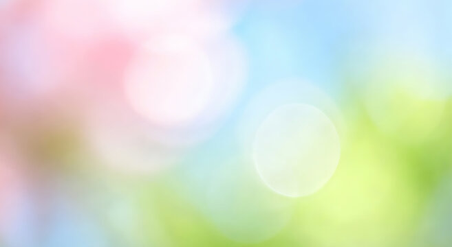 Soft-focus background with blurred pastel colors and bokeh light effects
