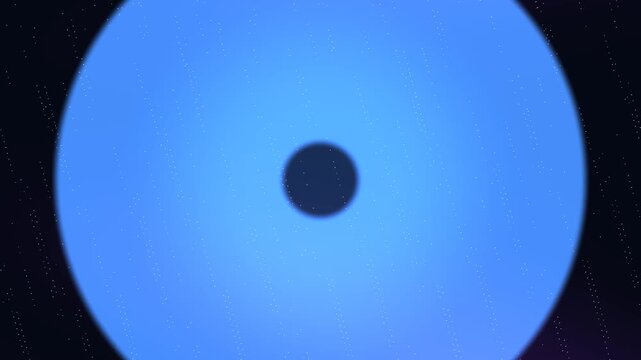 Blue ring rotates in space with white specks against black