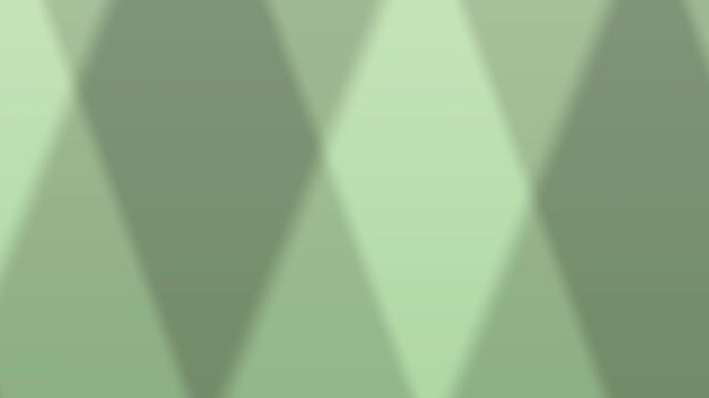 Green triangles overlap to form textured abstract pattern