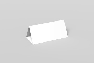 Minimalist blank white tent card mockup in a triangular folded shape, standing on a clean neutral background. Perfect for showcasing table name cards, restaurant menus, event signage, promotional.