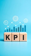 Stacked wooden blocks spell KPI beneath a rising bar graph and strategy icons on blue