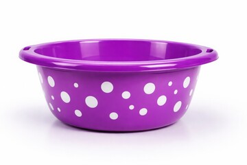Purple plastic basin with white polka dots for home laundry on white background