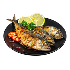 Delicious bruneian ikan panggang, a smoky and spicy grilled fish dish, served on a dark plate with fresh lime, isolated on white background