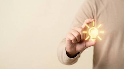idea innovation creativity inspiration concept brainstorming solution hand holding glowing light bulb symbol for new business strategies and creative thinking for success