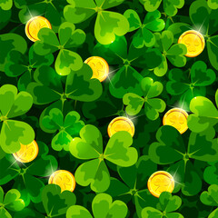 St. Patrick's day seamless pattern with green shamrock leaves and gold coins. Vector holiday seamless print