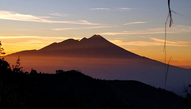 Mountain silhouette at sunrise