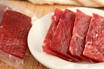 Obraz premium Delicious pork jerky snacks