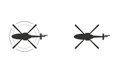 Isolated black silhouettes of helicopters on a white background. Icons of helicopters viewed from above. © Saulo