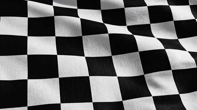 A close-up, detailed view of a checkered flag made of fabric, showing movement and texture. The black and white squares are clearly visible.