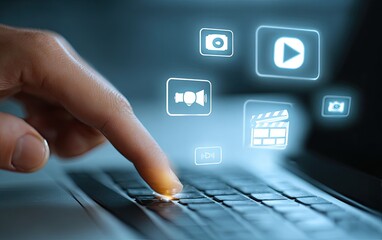 Finger touches keyboard, digital icons float above, representing media and technology