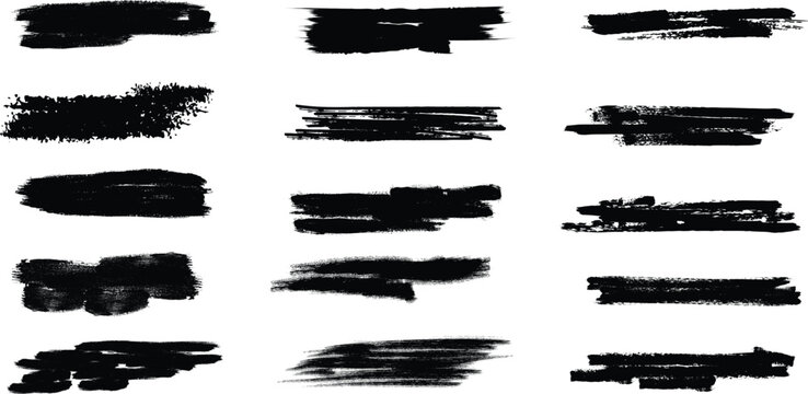 Collection of black brush stroke textures and smudges on white background