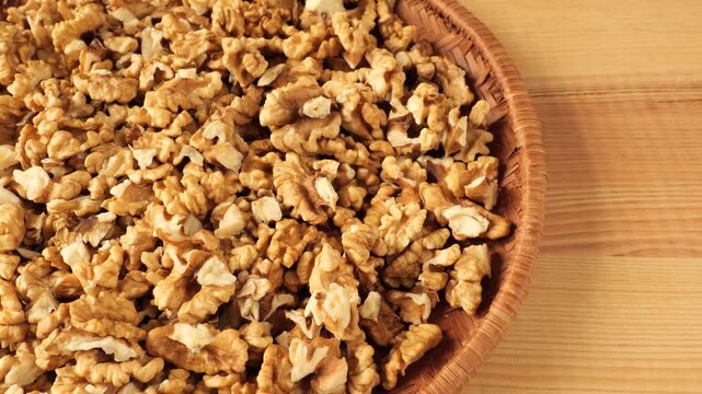 Shelled walnut kernels in a basket.