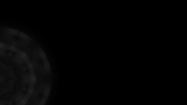 A dark, abstract composition. A gray-toned mandala on the left against a deep black background