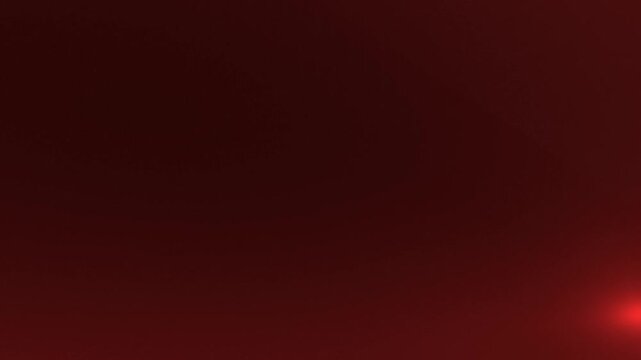 A gradient of deep reds, from a dark maroon to a vibrant rouge, subtle light accents