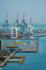 Fototapeta premium CHONBURI, THAILAND - January 6, 2026: Aerial view at night of Laemchabang port, Containers for exporting goods overseas.