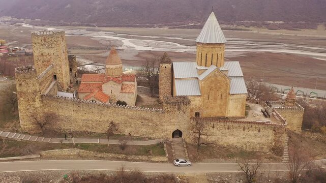 Drone view of the ancient defensive complex Ananuri Castle, located between the Georgian Military Road and the Zhinvali reservoir, Georgia. 