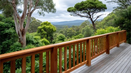 Wooden deck offering a view of a lush forest