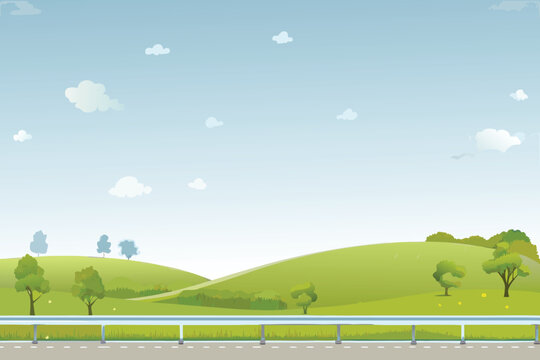 A serene landscape showcases a blue sky fluffy clouds and rolling green