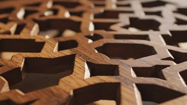 Scattered pieces of chocolate create an abstract pattern of brown food texture on a white background with a rustic industrial detail reminiscent of old iron