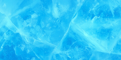 Abstract blue frozen ice texture background with translucent cracks and natural winter crystal pattern blue tones create a refreshing winter texture ideal for background. © Daiyan
