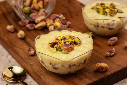 Pista Shrikhand is a traditional Indian dessert made from thick strained yogurt blended with sugar, cardamom, and rich pistachio (pista) flavor. Creamy, smooth, and delicately sweet, it is garnished w
