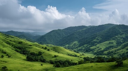 Fototapeta premium Lush green mountains with rolling hills create
