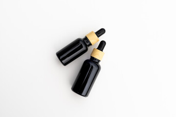 Black Serum Bottle Isolated on Clean White Background for Beauty Display