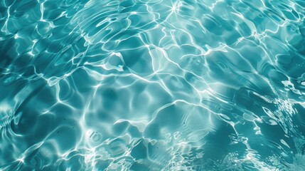 Obraz premium Vibrant turquoise water ripples with sparkling sunlight reflections creating abstract patterns