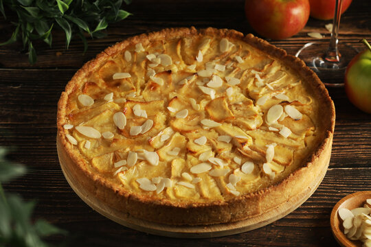 French Normandy apple cake, freshly baked on the table	