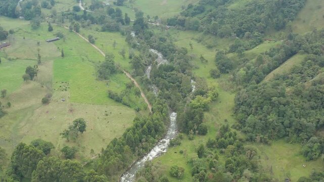 drone view in quindio, colombia, amazing view from drone in the mountaiin of region salento colombia coffee zone river n mountains