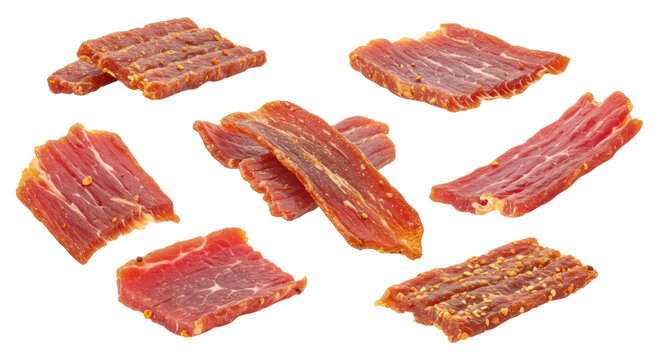 Assorted thin slices of seasoned beef jerky arranged on a transparent background
