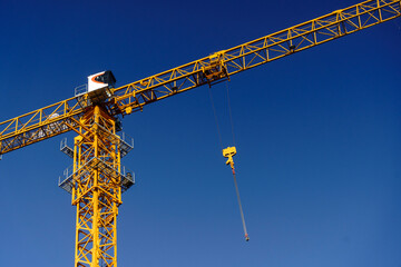 Tower Crane Operating on an Active Urban Construction Site