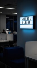 Illuminated Sign in Modern Interior Demands Quiet, Suggesting a Focused Environment for Work