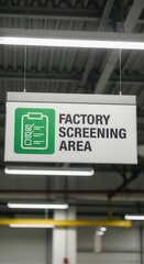 Industrial Factory Area: Screening Signage Illuminated by Overhead Fluorescent Lighting