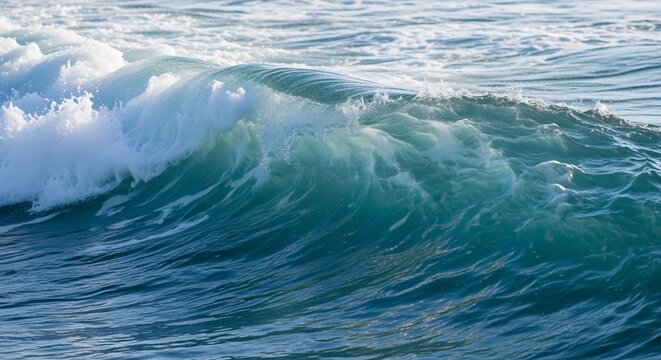 Powerful Ocean Wave Crashing with White Foam and Turquoise Water.