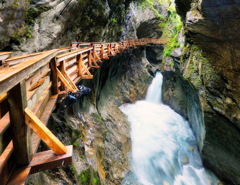 Autria waterfall in Alps, Sigmund Thun Gorge cascade and canyon with river in Kaprun