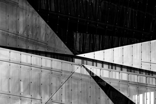 Modern concrete interior structure with minimal architecture and abstract geometry lines casting shadows for atmospheric design background