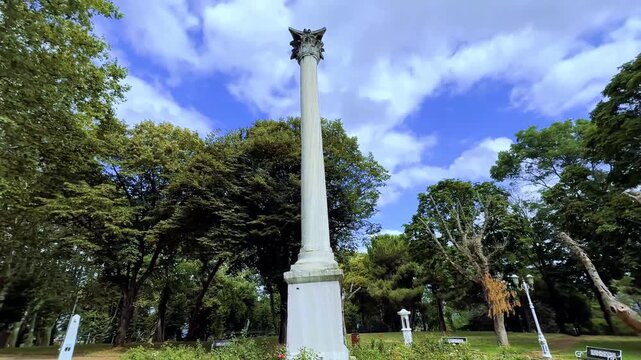 Beautiful view of the Column of the Goths in Gulhane Park in Istanbul, Turkey next to the Topkapi Palace. The statue is a symbol of victory and ancient Roman architecture.