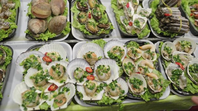 Fresh Scallops On Plates Vietnam Street Market Rows Of Garnished Shellfish With Lime Slices And Cilantro Over Lettuce, Plastic Trays Neatly Arranged, Vivid Colors, Closeup Food Display,