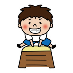 跳び箱をとぶ元気でやんちゃな子供（男の子）