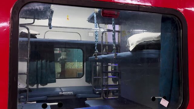indian railway 3ac passenger train interior with foldable berths and compact cabin design