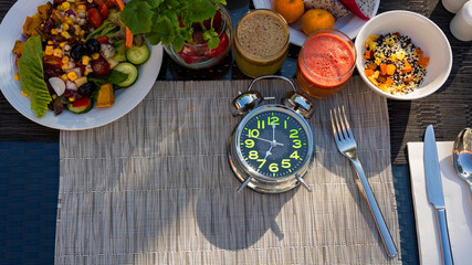Healthy Meal Timing with white  Alarm Clock Waiting for the IF Meal